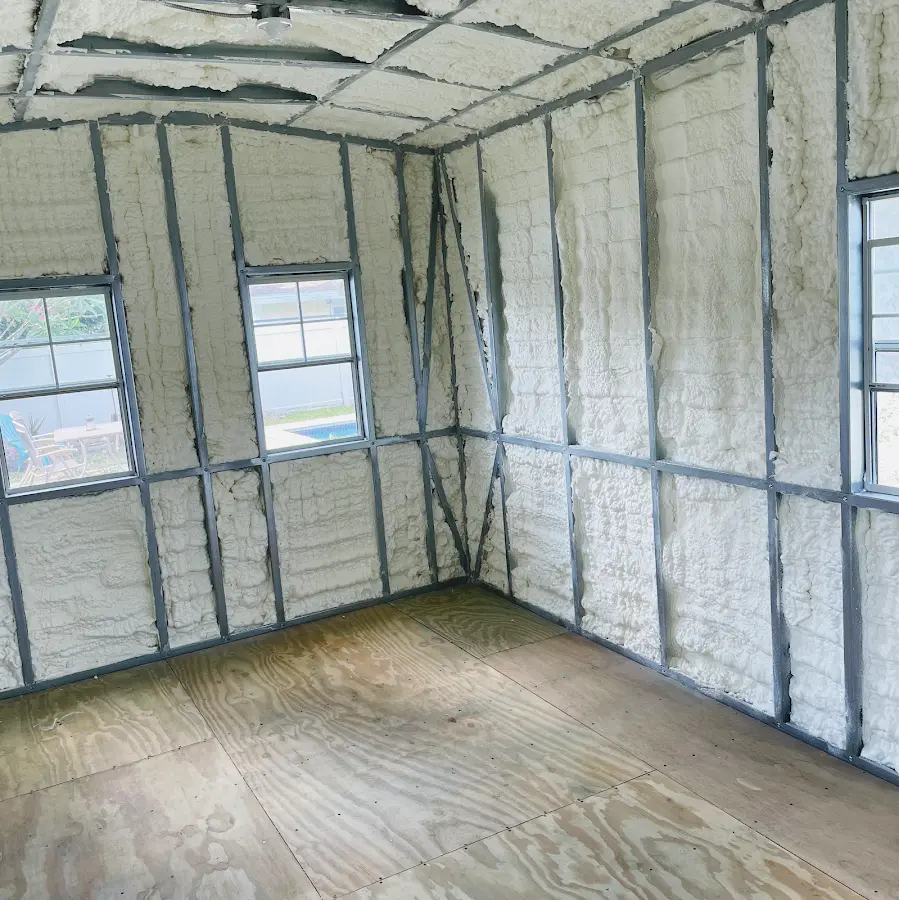 Closed-cell spray foam insulation applied to wall cavities in a residential project in Jacksonville Beach